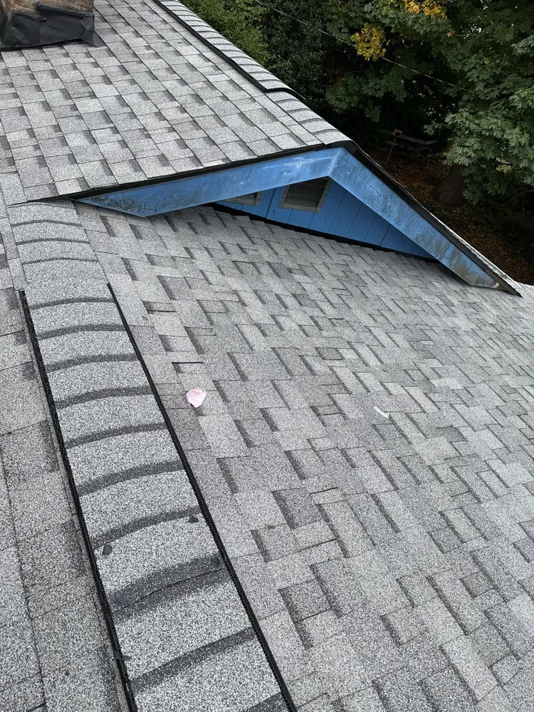 Slide of M&H Roofing Services