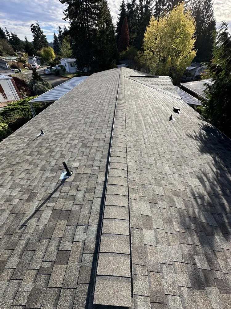 Slide of M&H Roofing Services