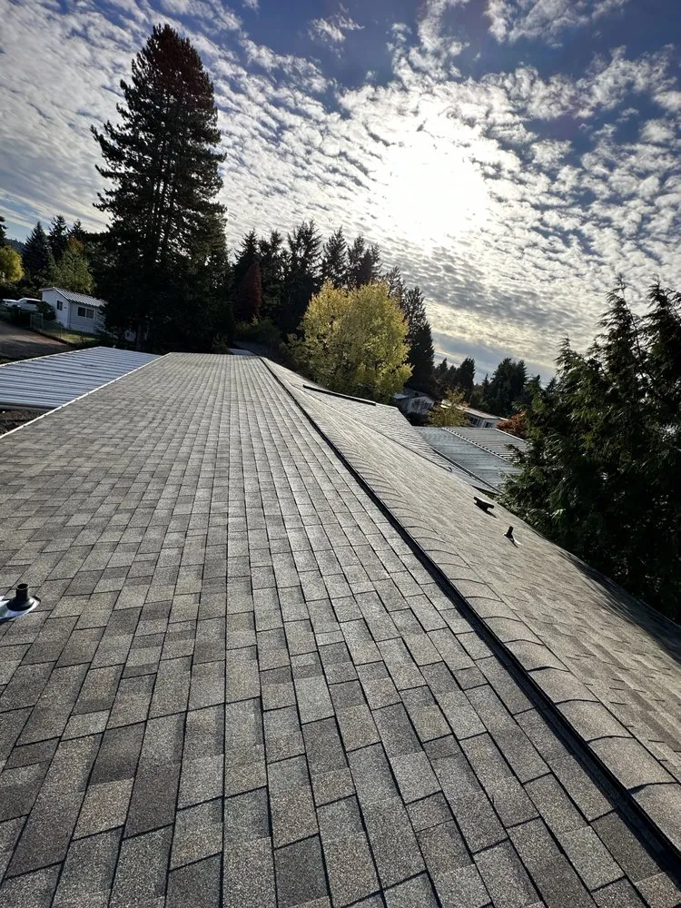 Slide of M&H Roofing Services