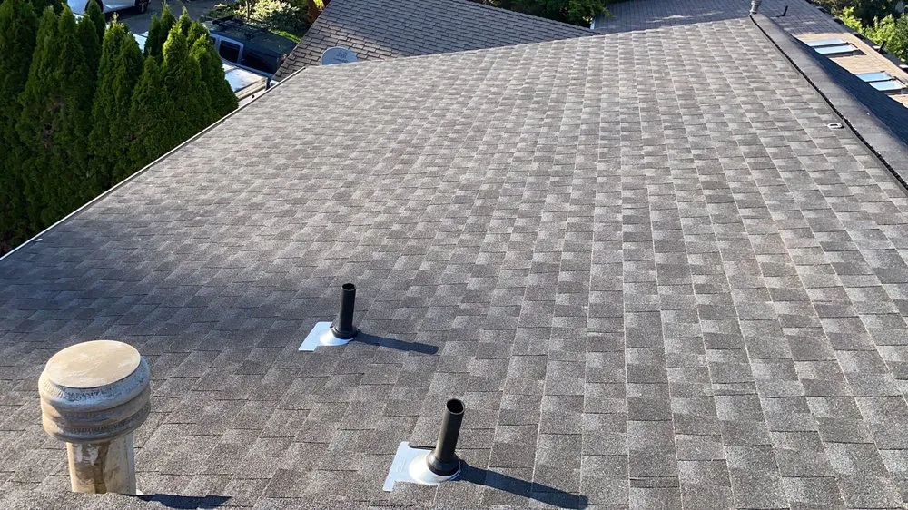 Slide of M&H Roofing Services