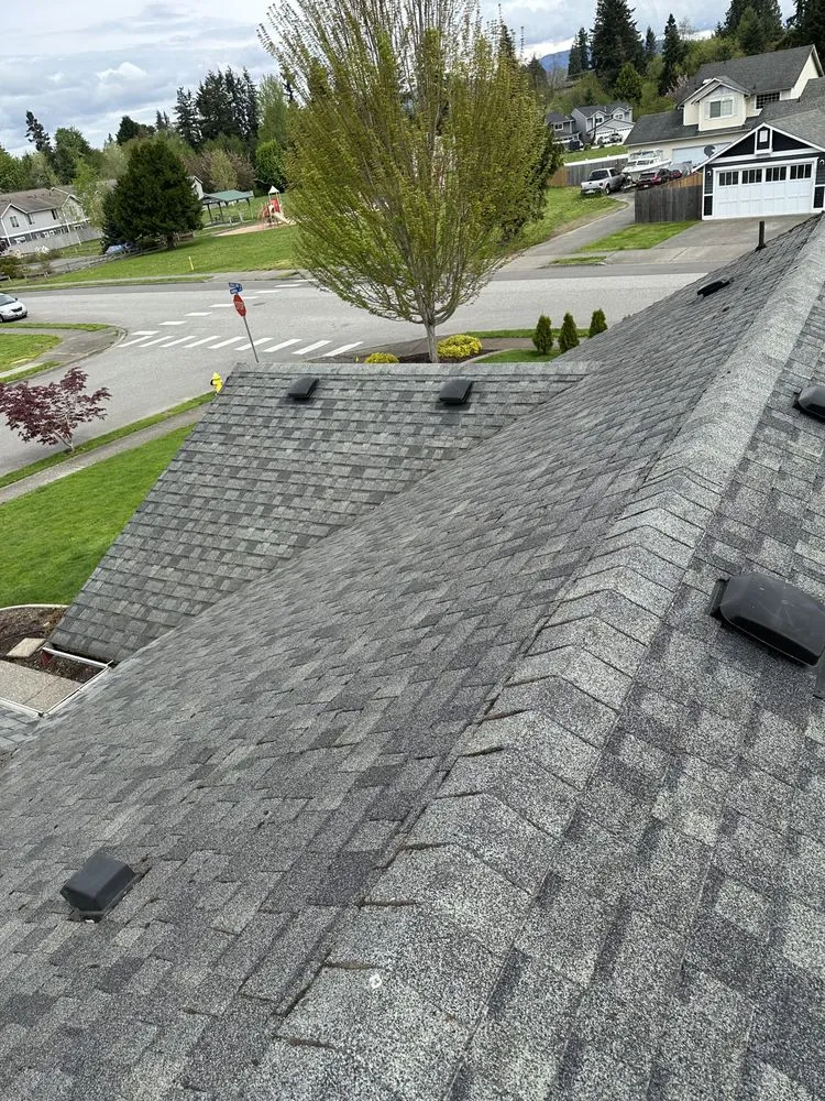 Slide of M&H Roofing Services