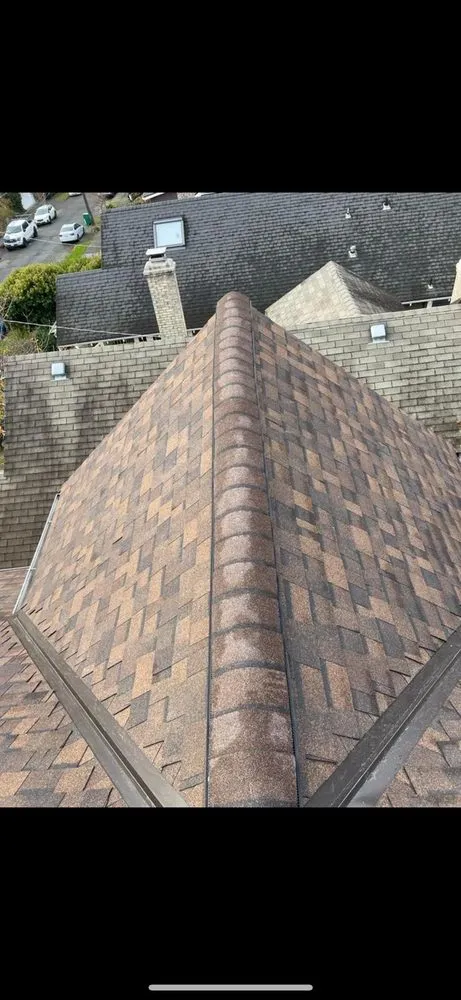 Slide of M&H Roofing Services