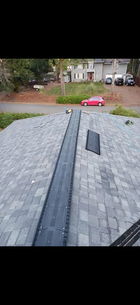 Slide of M&H Roofing Services