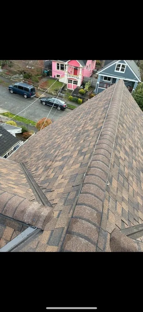 Slide of M&H Roofing Services