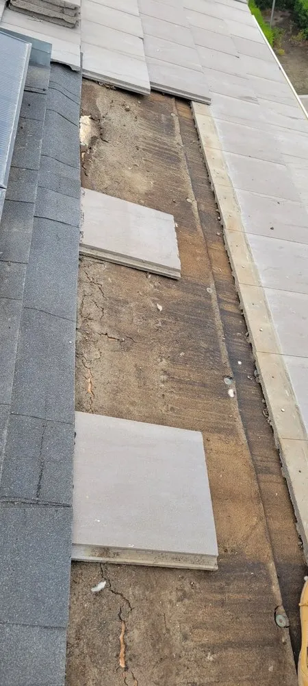 Slide of MHC Roofing