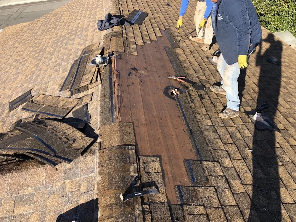 Slide of MHC Roofing