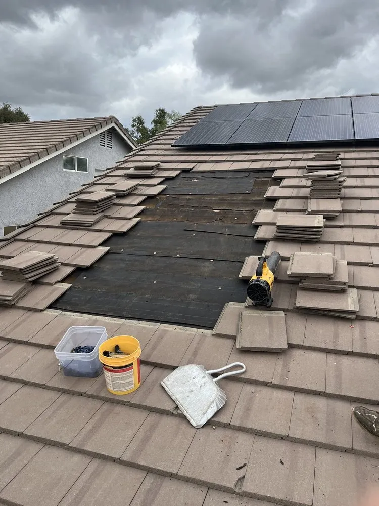 Slide of MHC Roofing