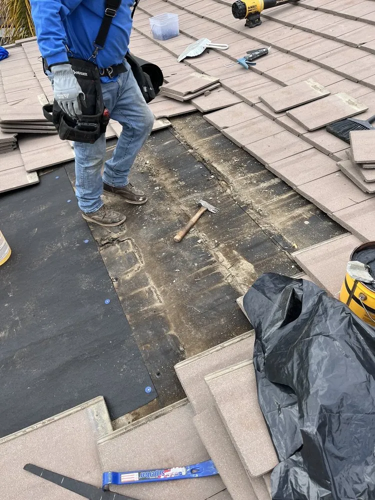 Slide of MHC Roofing