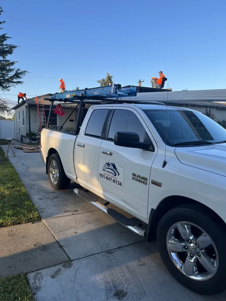 Slide of MHC Roofing