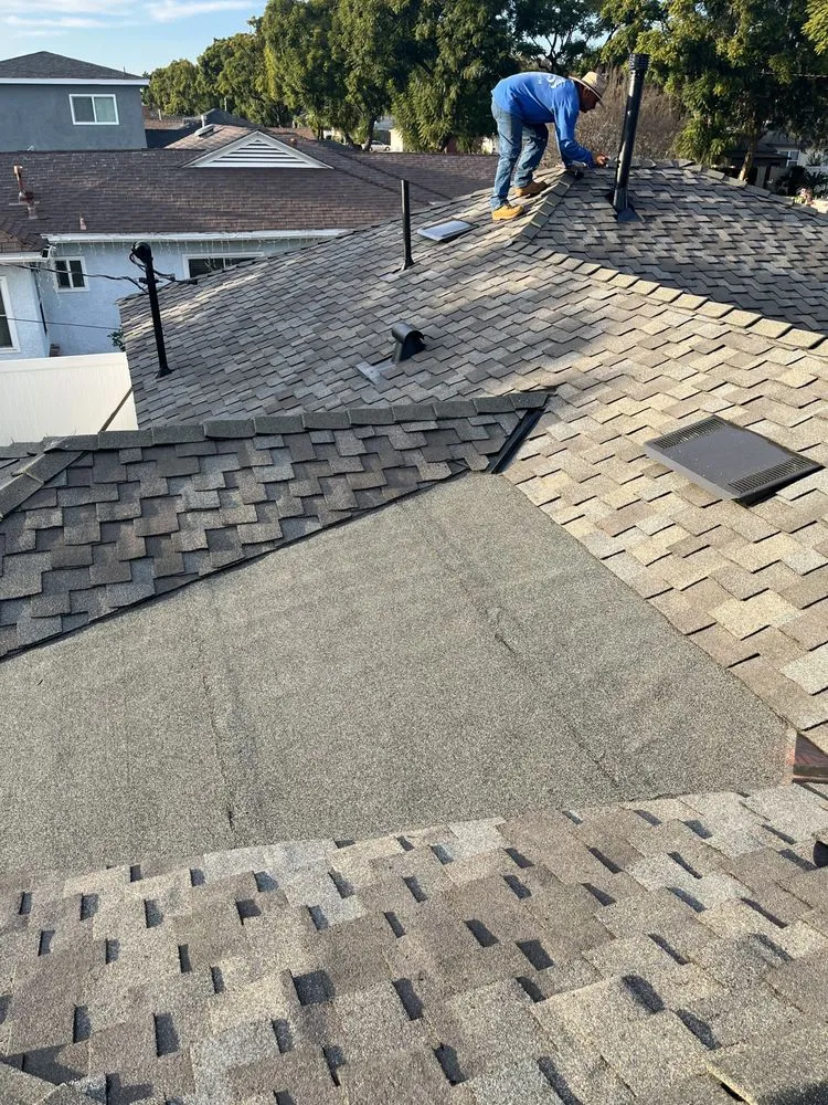 Slide of MHC Roofing