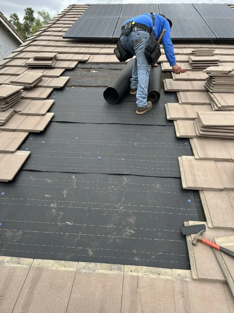 Slide of MHC Roofing