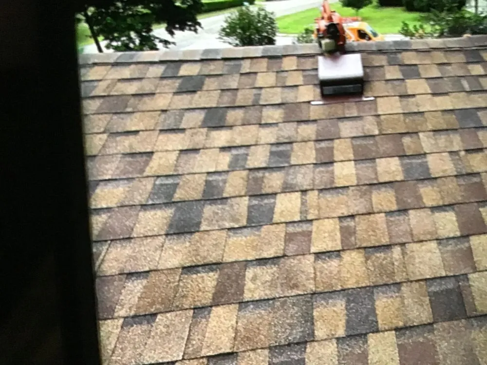 Slide of MHI Roofing