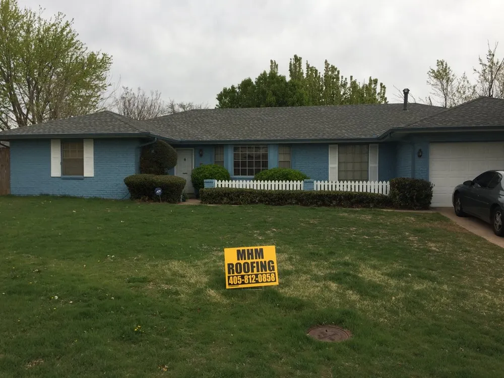 Slide of MHM Roofing