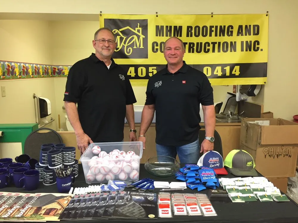 Slide of MHM Roofing