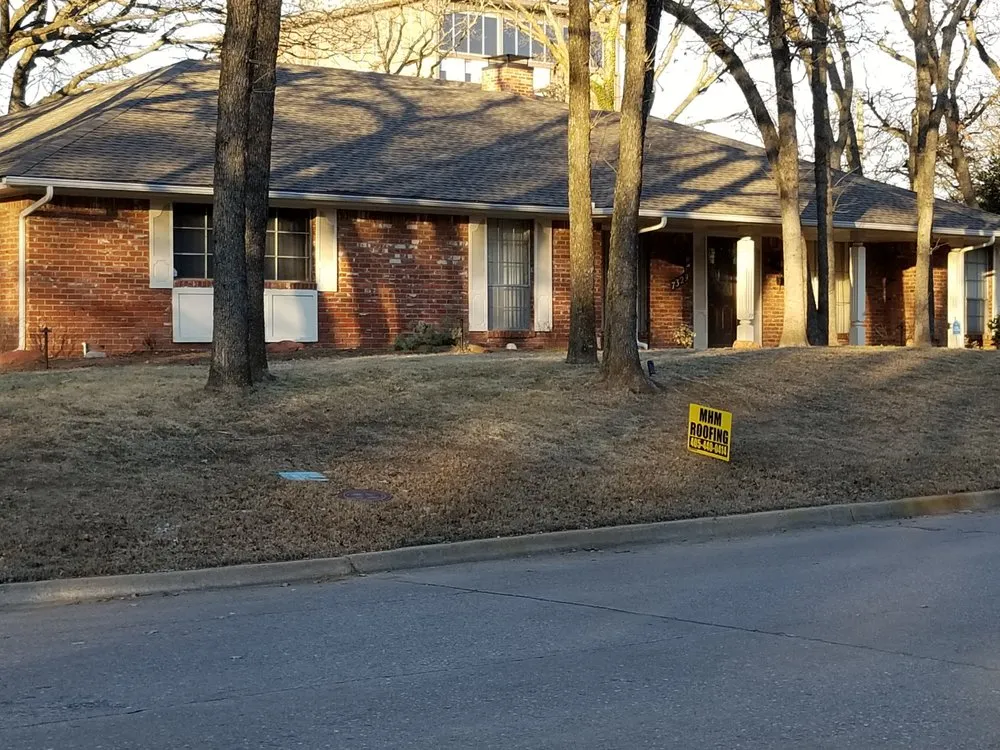 Slide of MHM Roofing