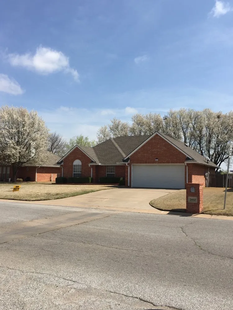 Slide of MHM Roofing