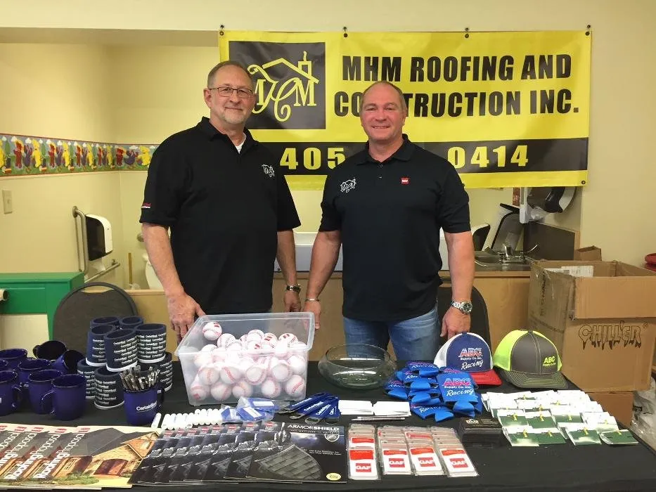 Slide of MHM Roofing