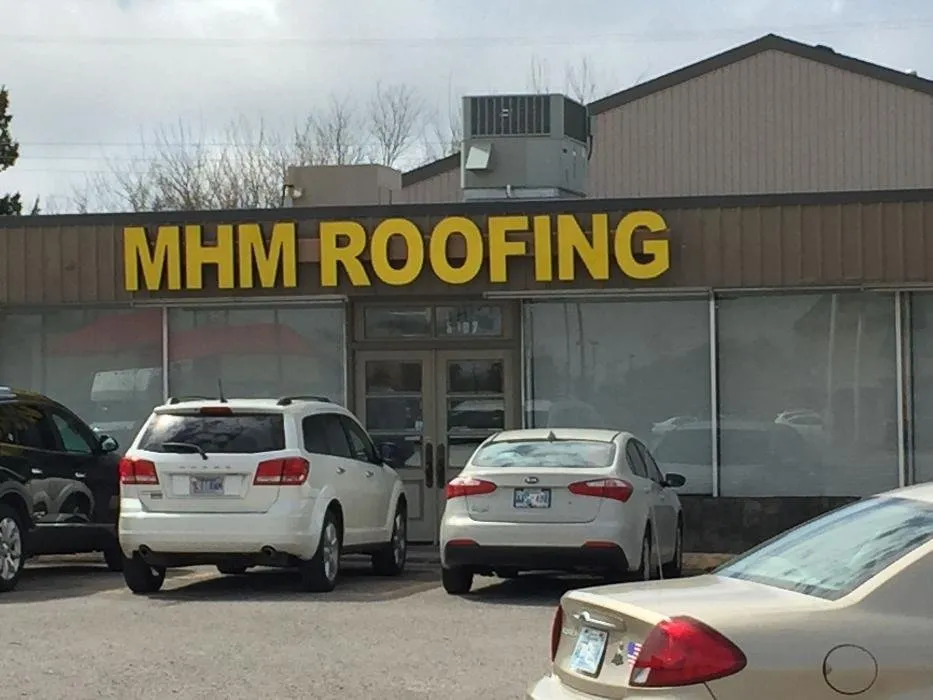 Slide of MHM Roofing