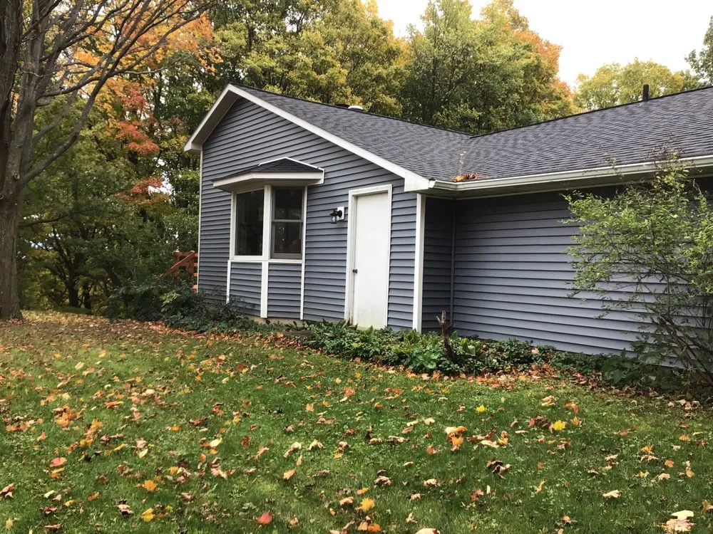 Slide of MI Roofing Contractor