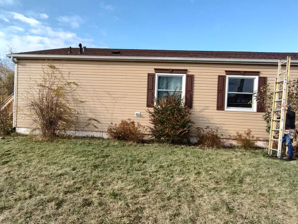 Slide of MI Roofing Contractor