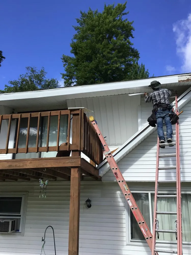 Slide of MI Roofing Contractor