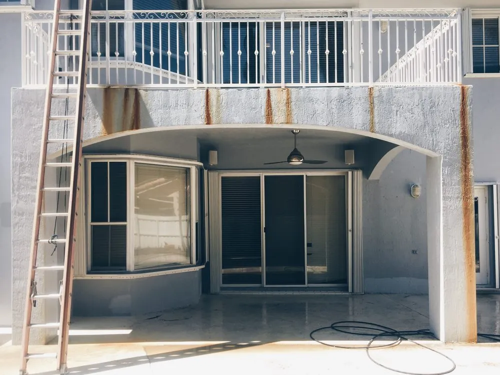 Slide of Miami Roof Cleaning Services