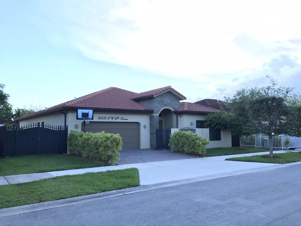 Slide of Miami Roof Cleaning Services