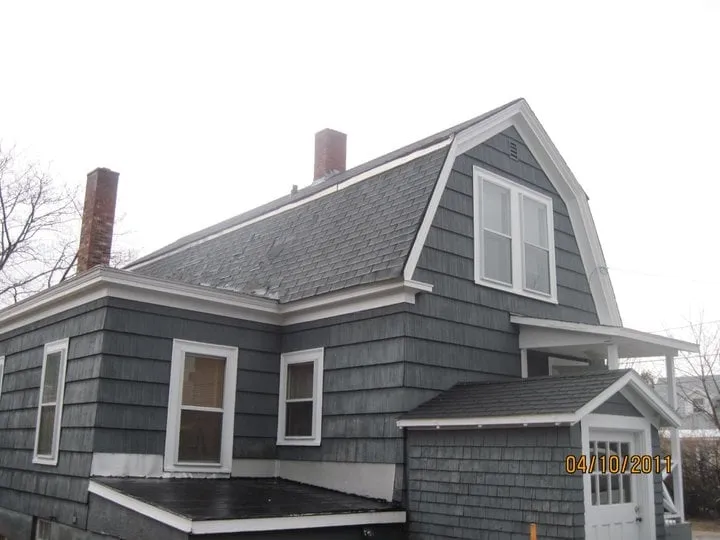 Slide of Michael Champion Roofing