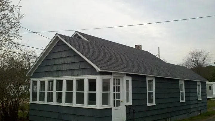 Slide of Michael Champion Roofing