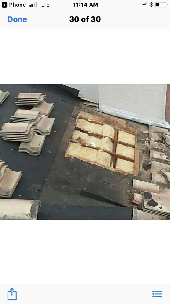 Slide of Michiel Roofing