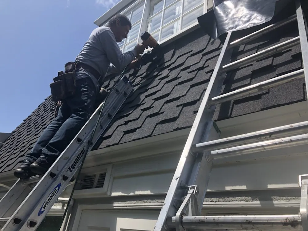 Slide of Michiel Roofing