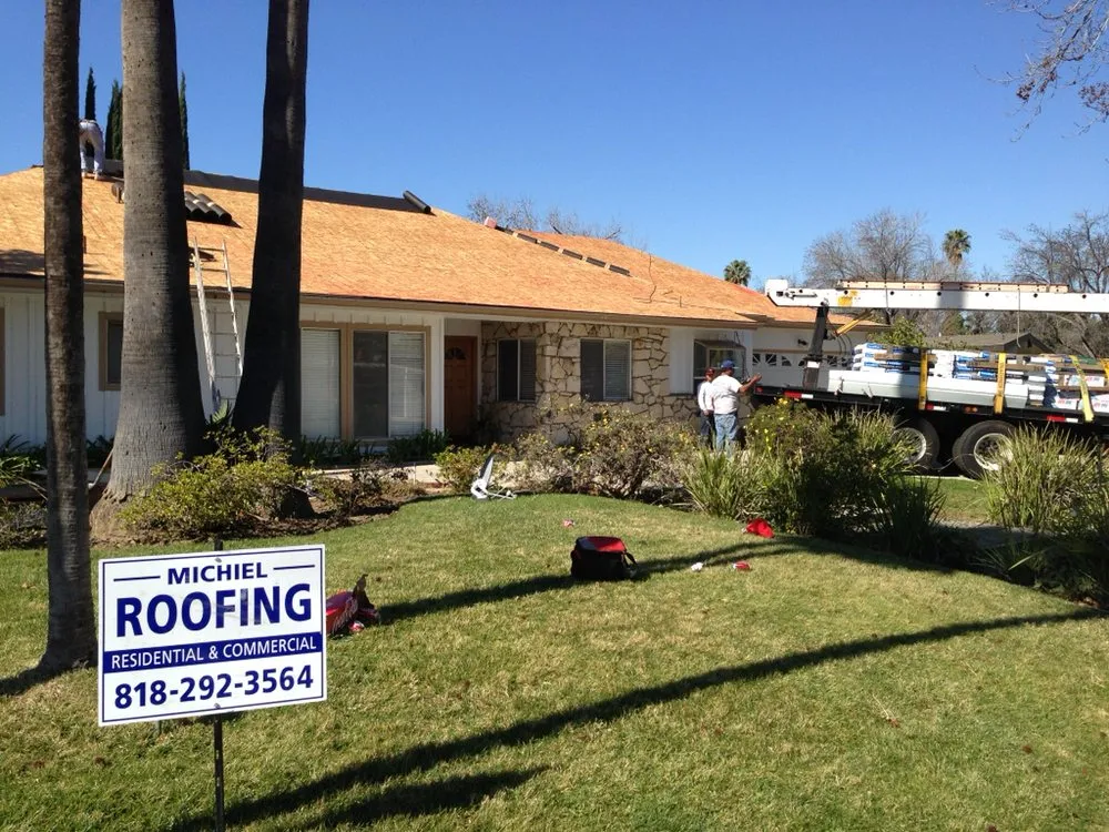 Slide of Michiel Roofing