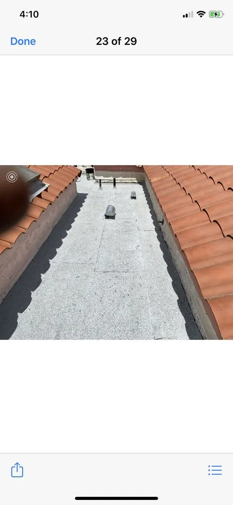 Slide of Michiel Roofing