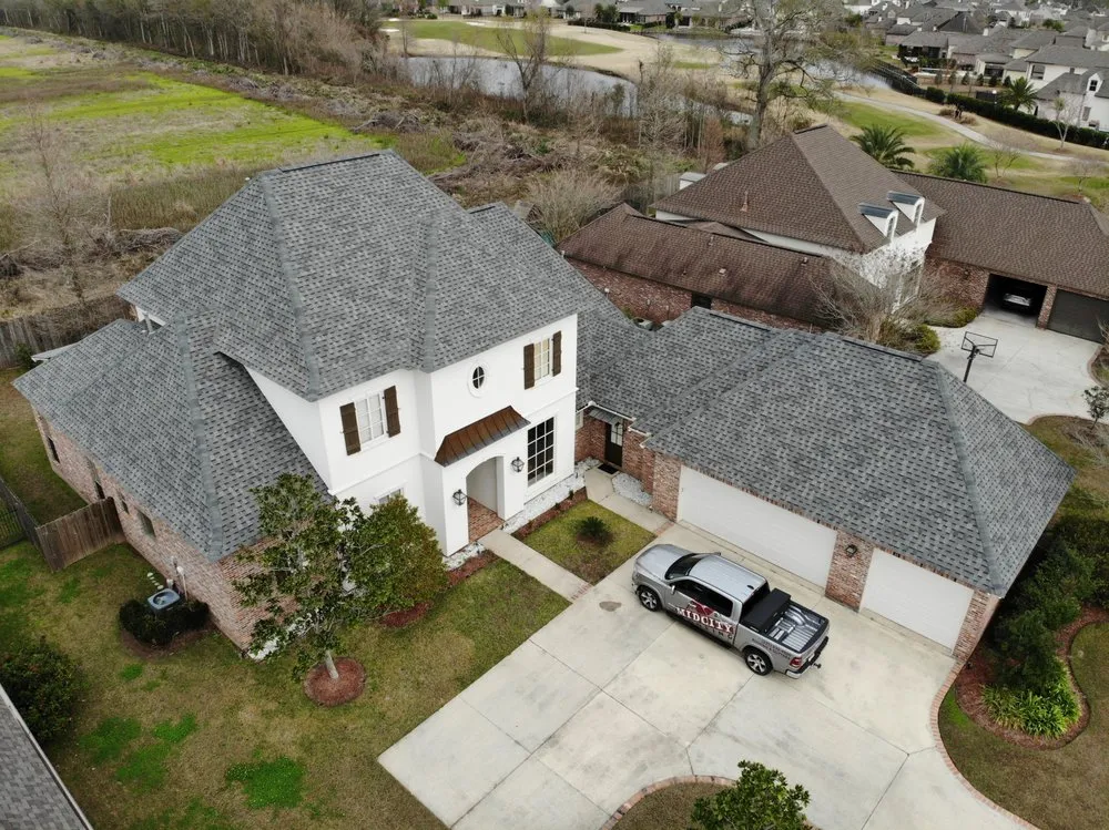 Slide of Mid City Roofing