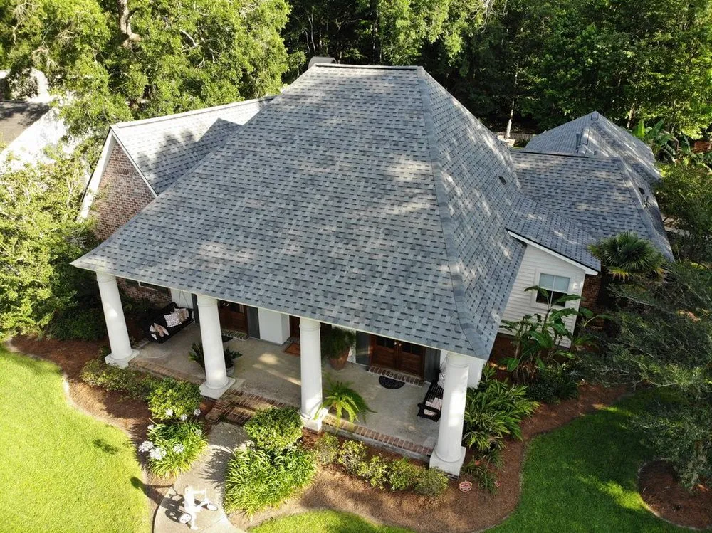 Slide of Mid City Roofing