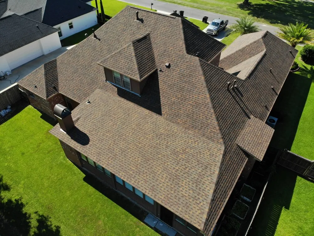 Slide of Mid City Roofing