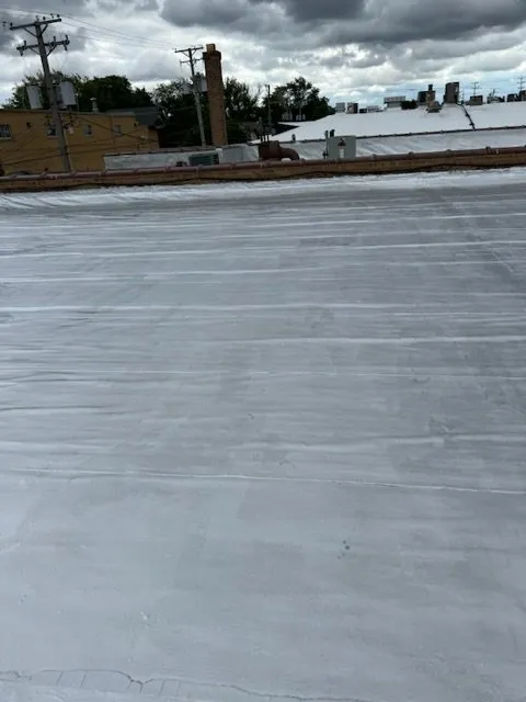 Slide of Mid City Roofing