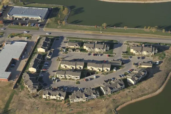 Mid Kansas Exteriors Logo