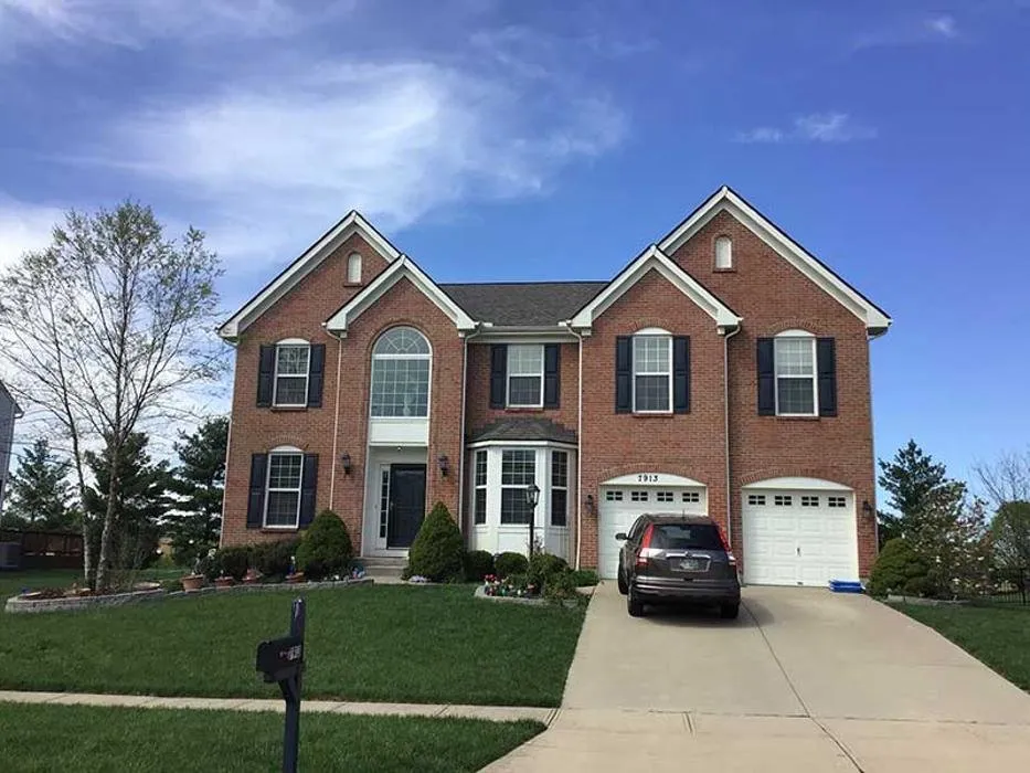 Slide of Mid-Miami Roofing