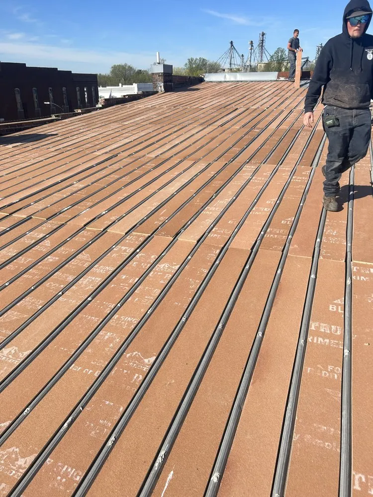 Professional metal roofing installation for residential properties in Beecher City, IL by Mid-State Construction And Roofing