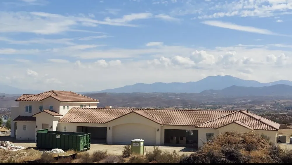 Slide of Midas Roofing