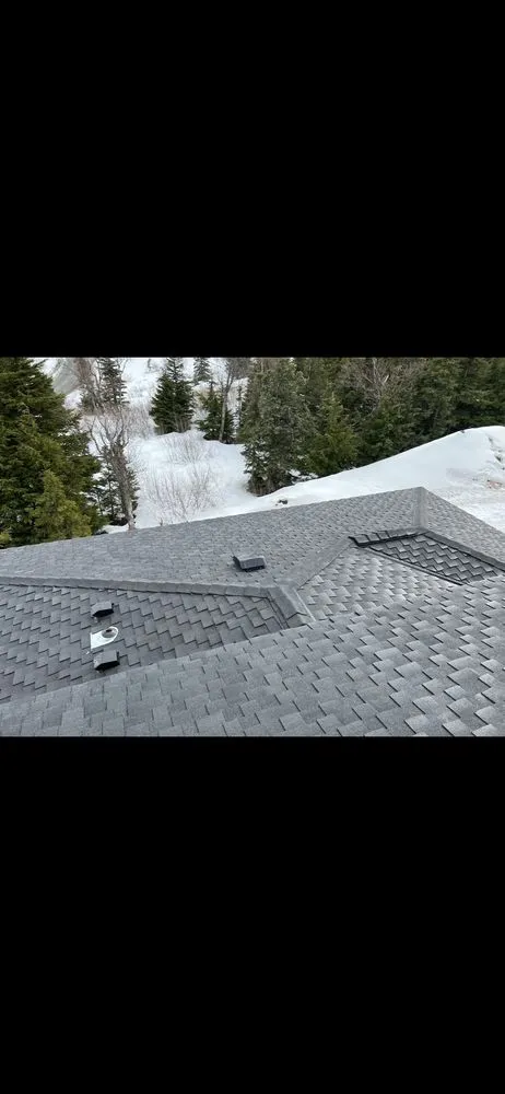 Slide of Middle Mitten Roofing