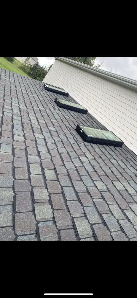 Slide of Middle Mitten Roofing