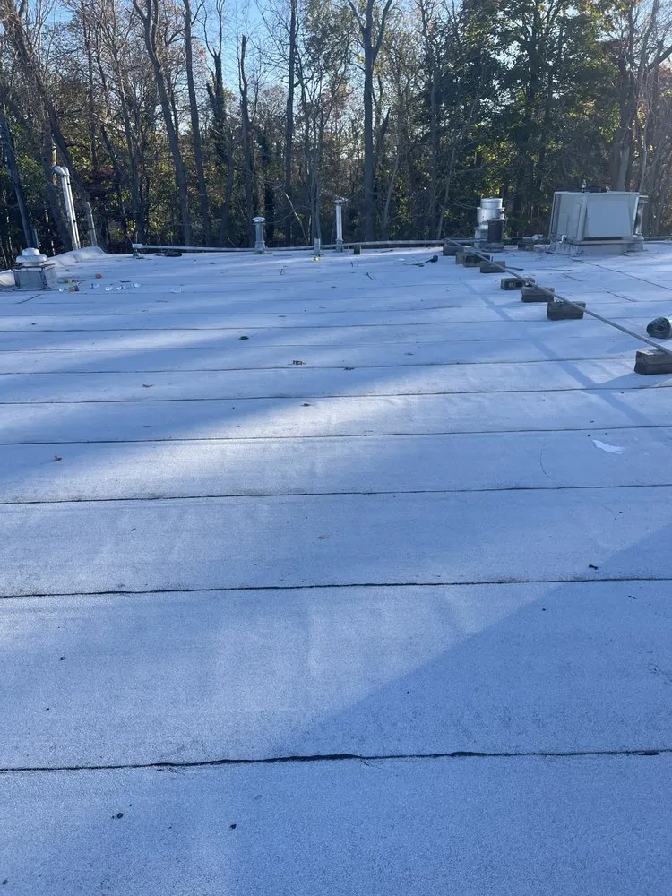 Slide of Midisland Roofing and Seal Coating