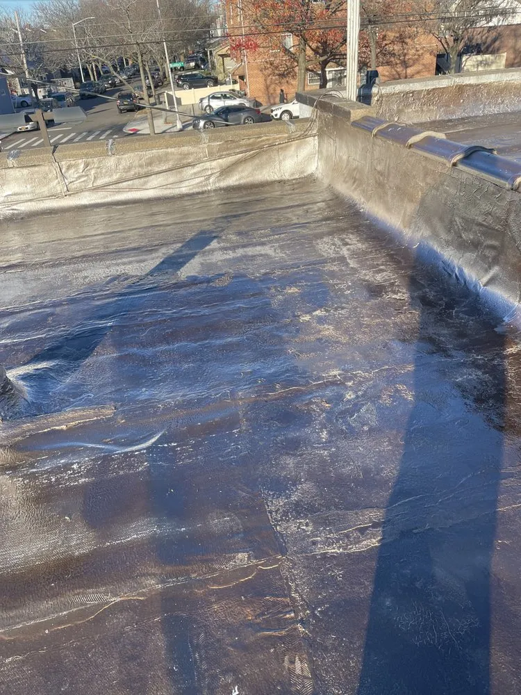 Slide of Midisland Roofing and Seal Coating