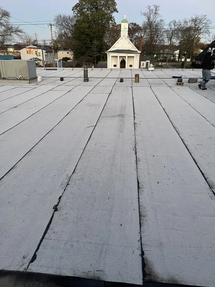 Slide of Midisland Roofing and Seal Coating