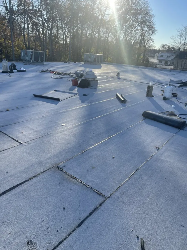 Slide of Midisland Roofing and Seal Coating