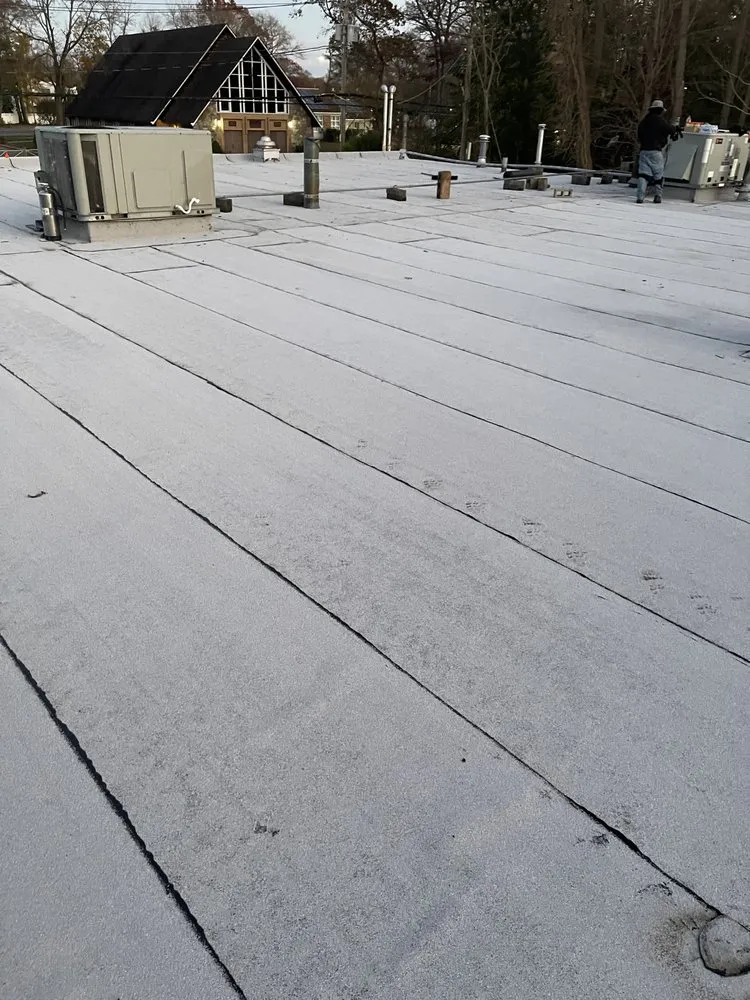 Slide of Midisland Roofing and Seal Coating