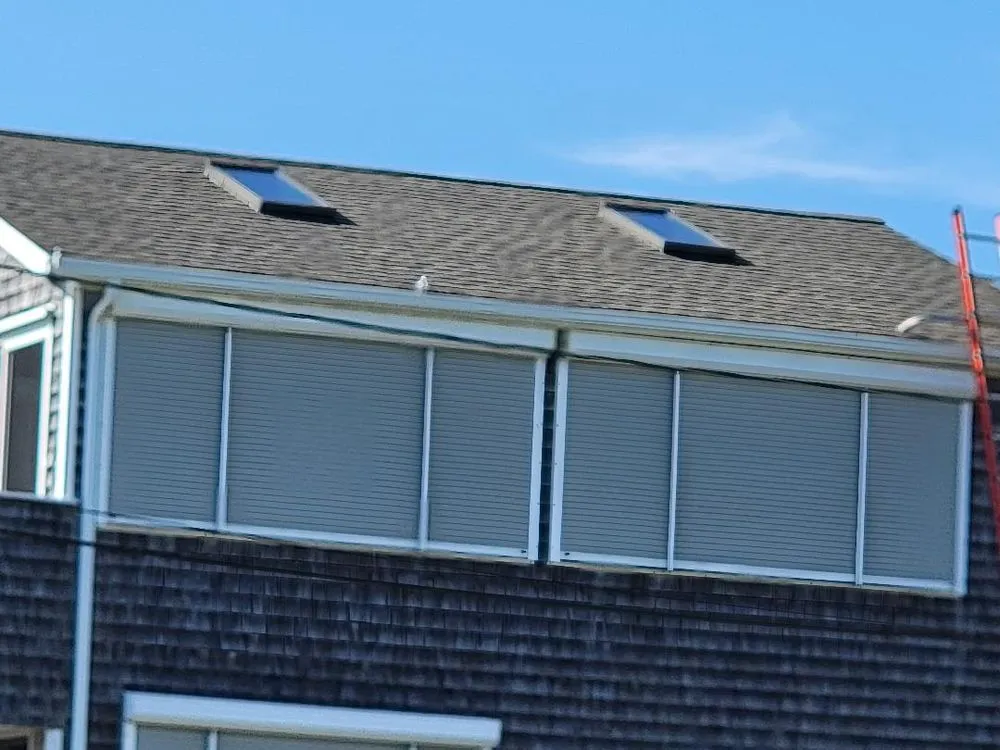 Slide of Midland Roofing