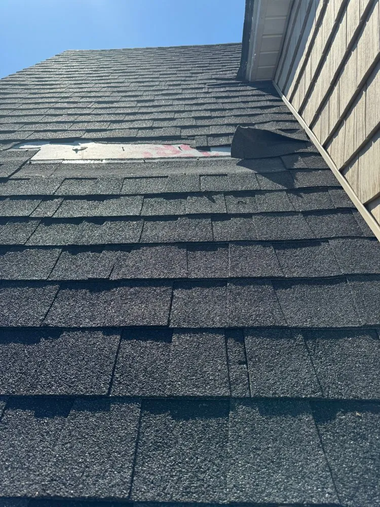 Slide of Midtown Roofing